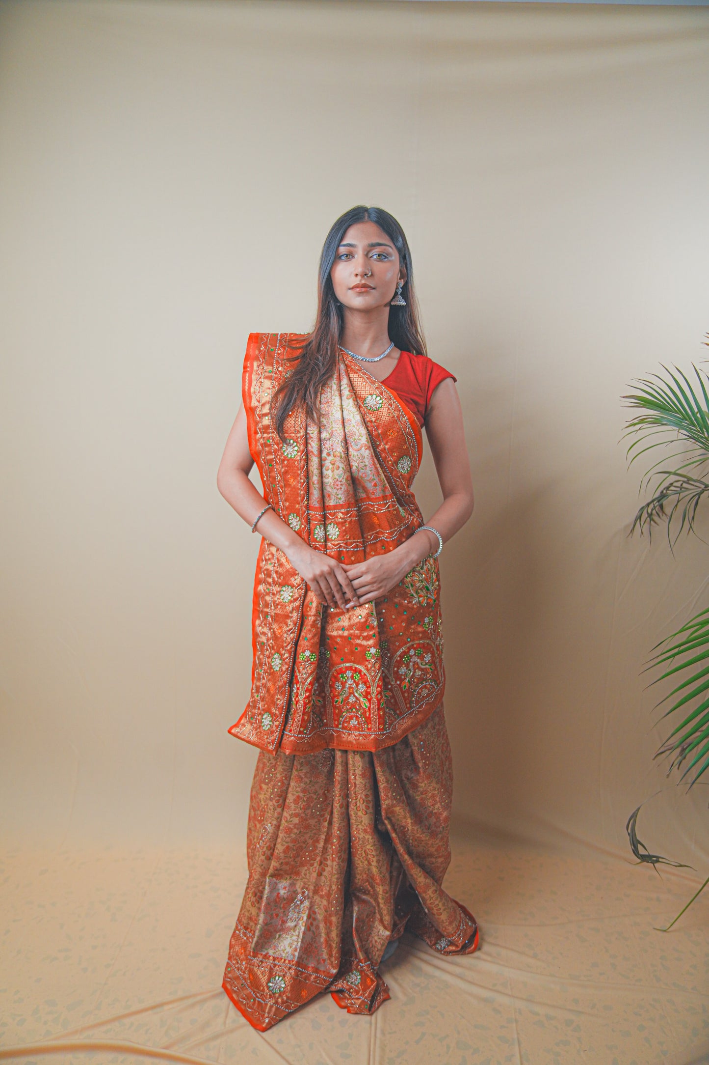 Rust Orange Kanjeevaram Silk Saree with Elegant Kundan Work