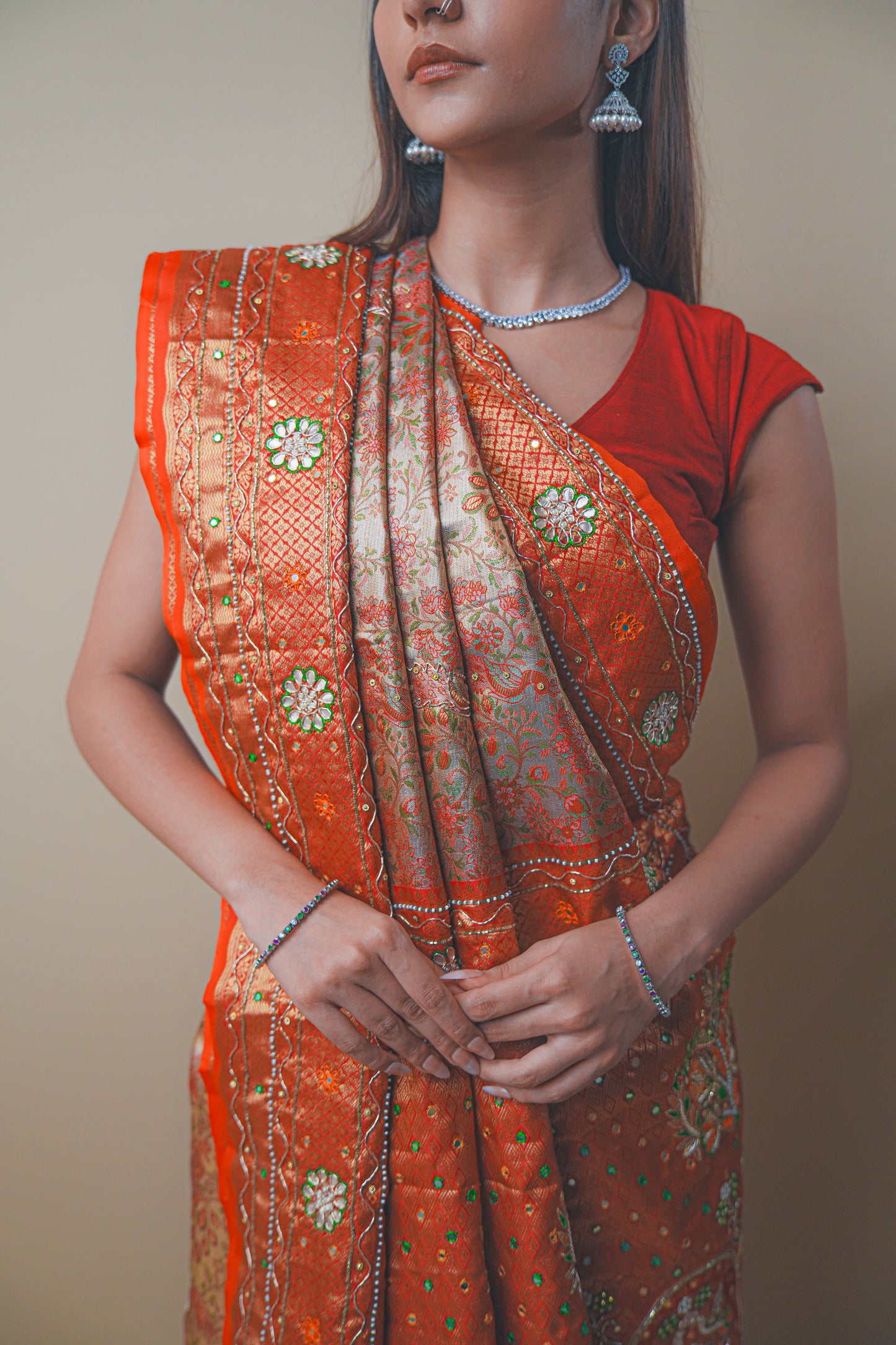 Rust Orange Kanjeevaram Silk Saree with Elegant Kundan Work