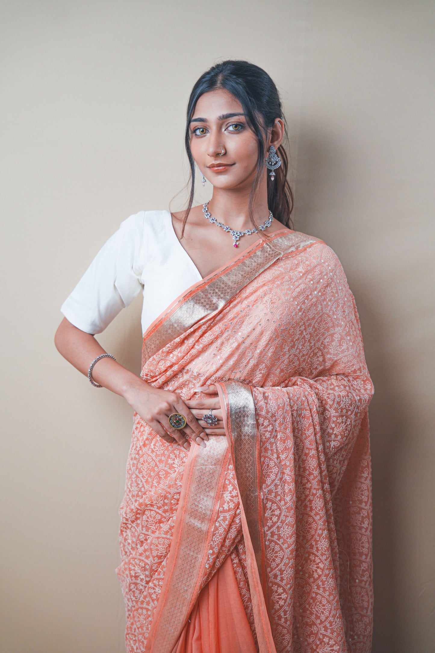 Graceful Peach Chiffon Saree with Resham Thread Embroidery & Golden Zari Border