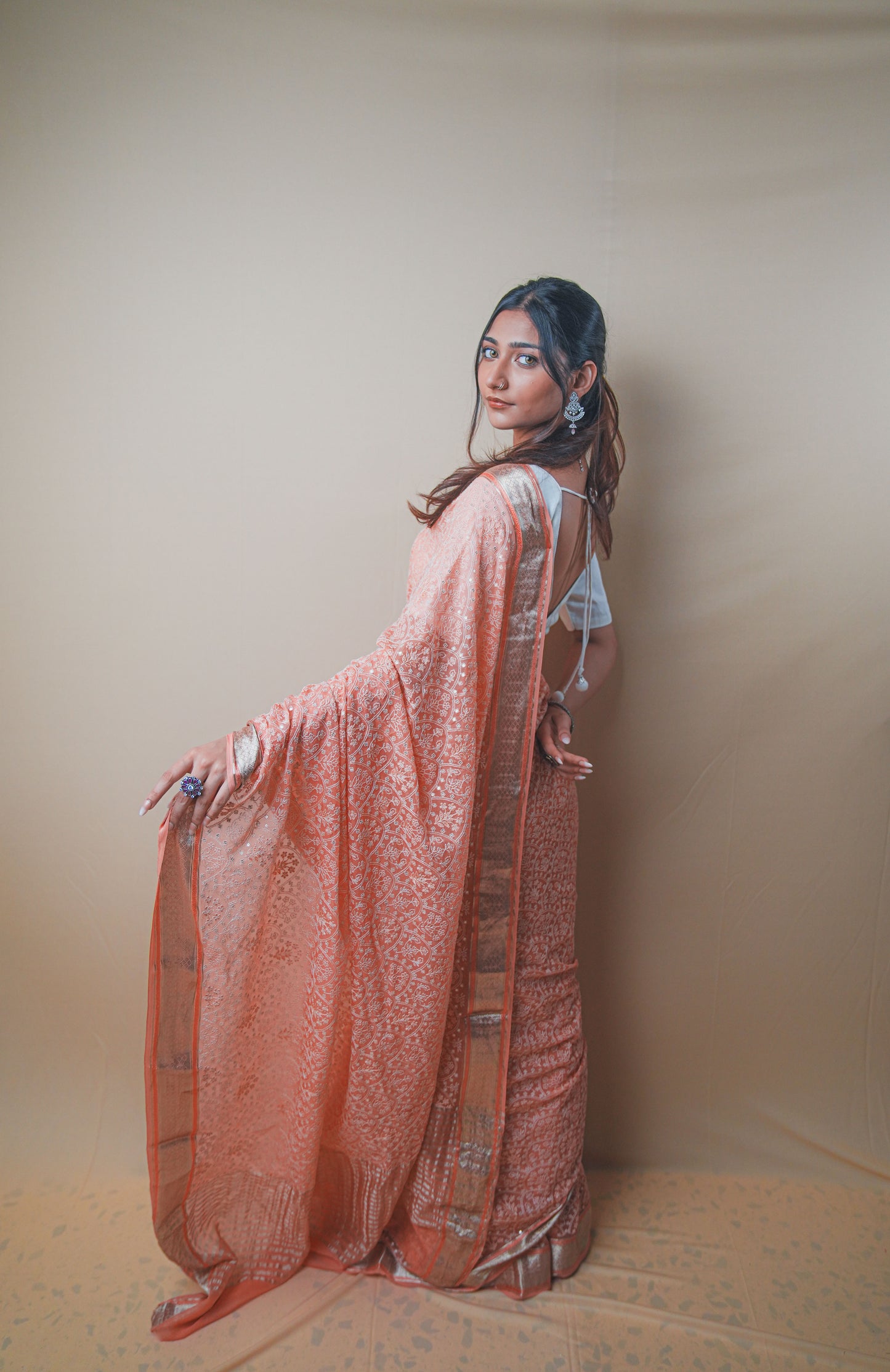 Graceful Peach Chiffon Saree with Resham Thread Embroidery & Golden Zari Border