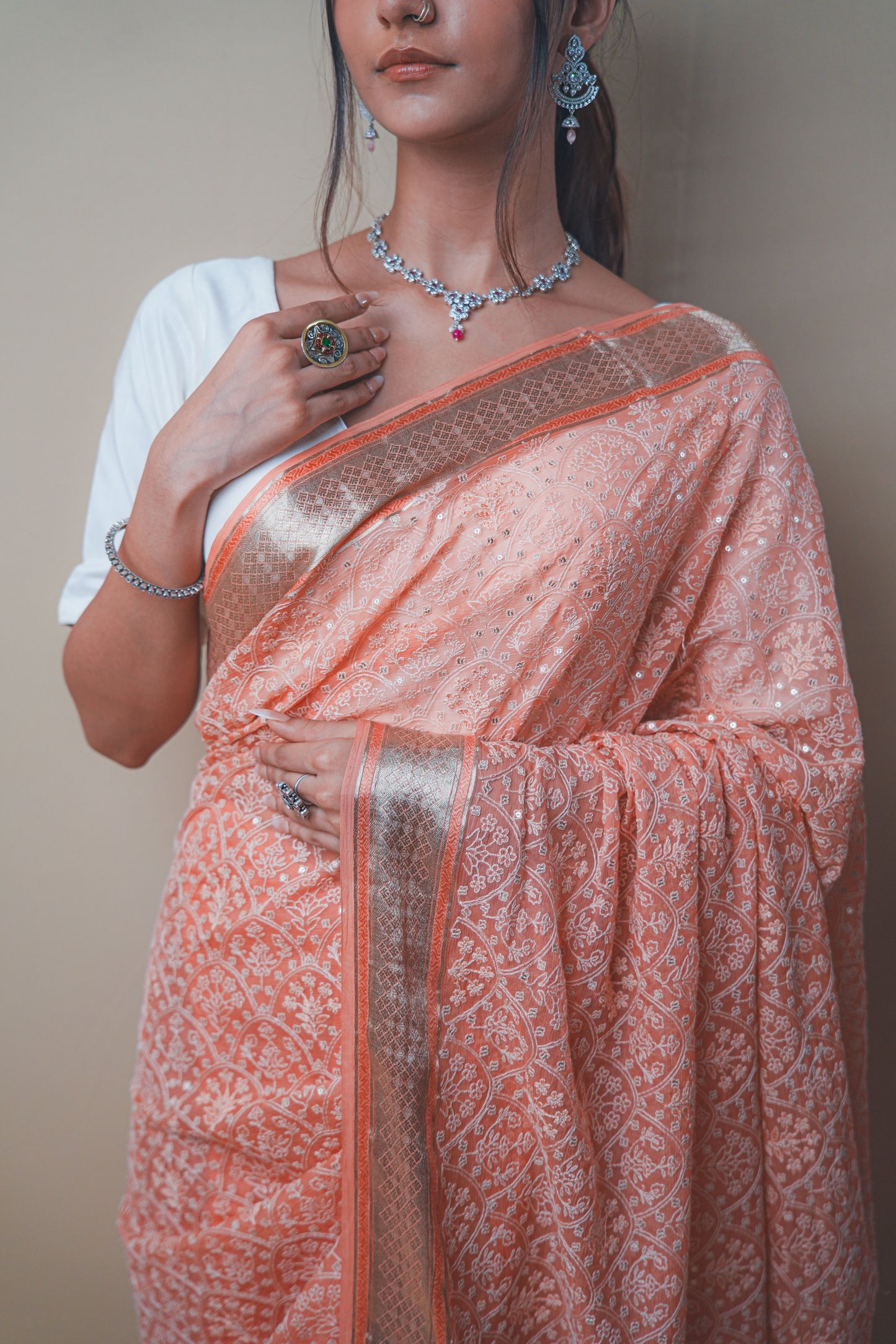Graceful Peach Chiffon Saree with Resham Thread Embroidery & Golden Zari Border