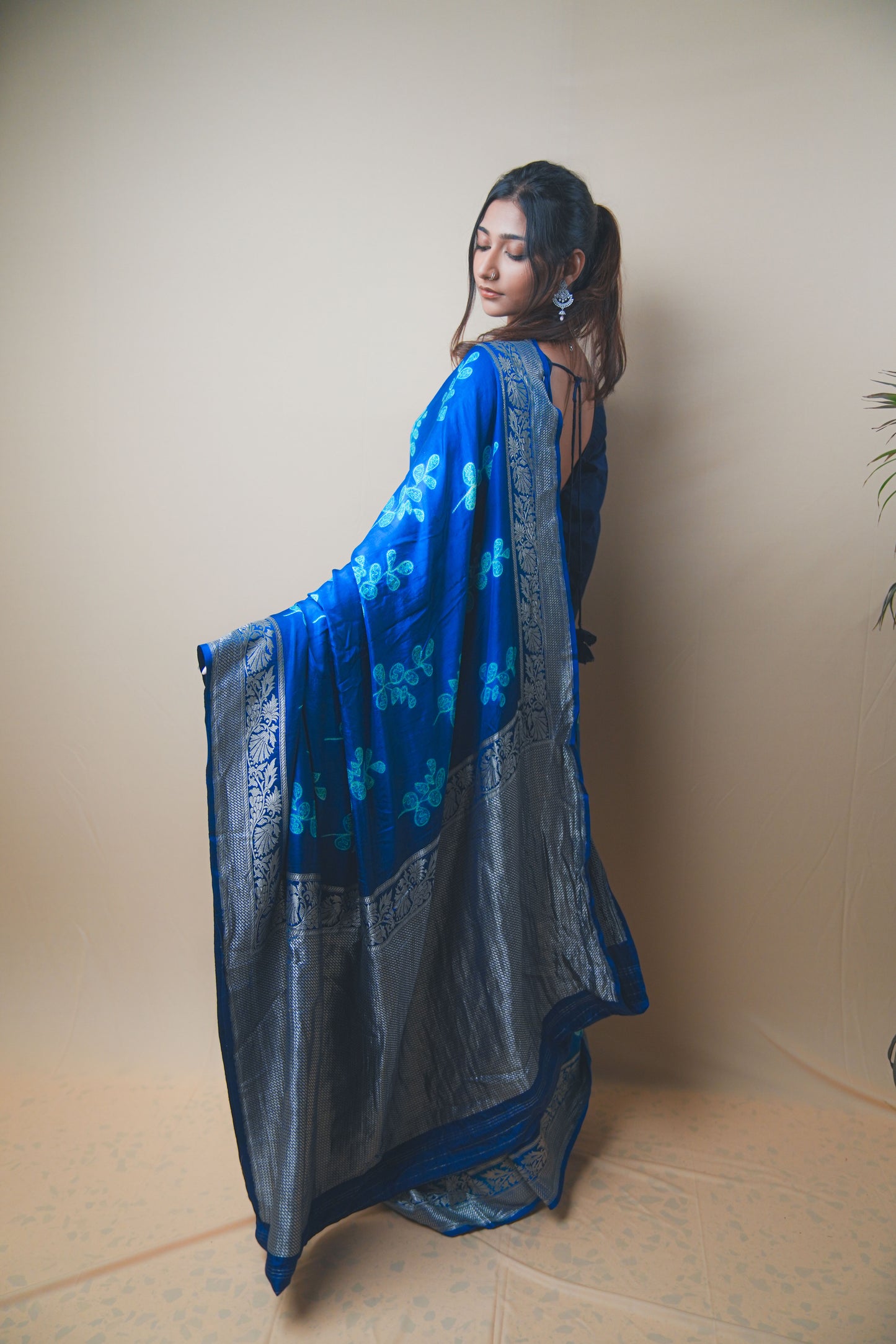 Elegant Blue Satin Silk Saree Featuring Silver Zari and Printed Patterns