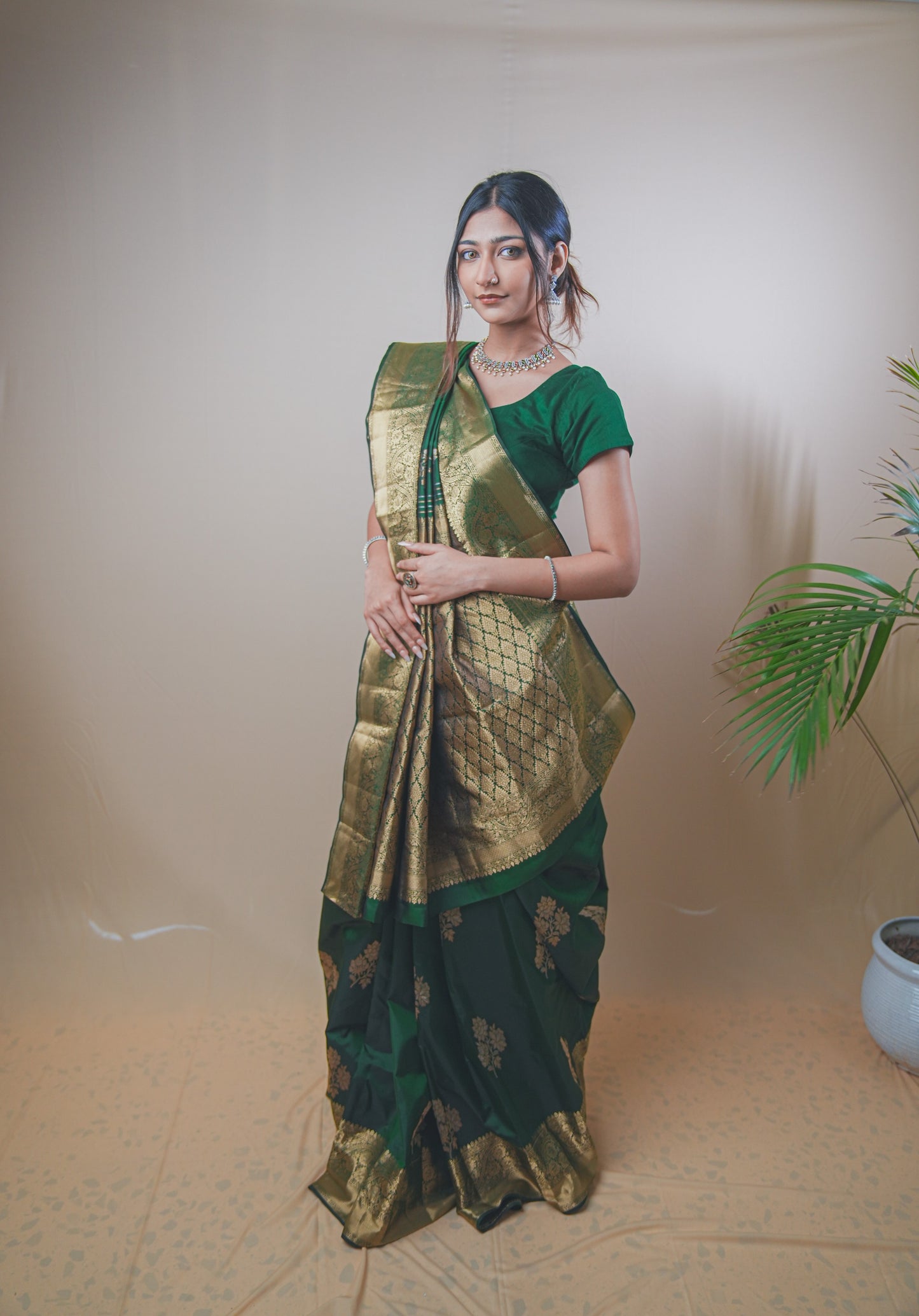 Traditional Green Kanjivaram Silk Saree Featuring Detailed Zari Work