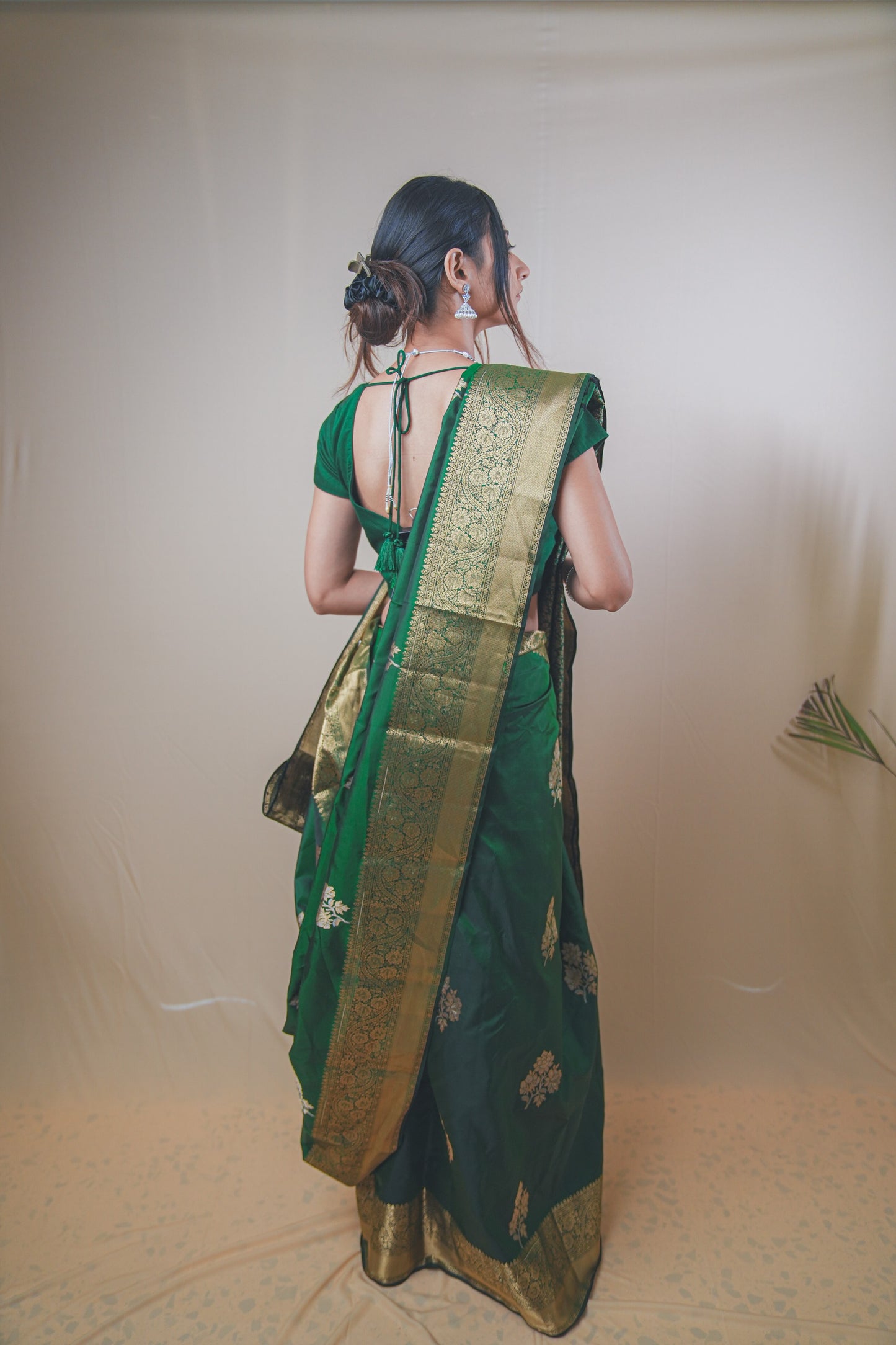 Traditional Green Kanjivaram Silk Saree Featuring Detailed Zari Work