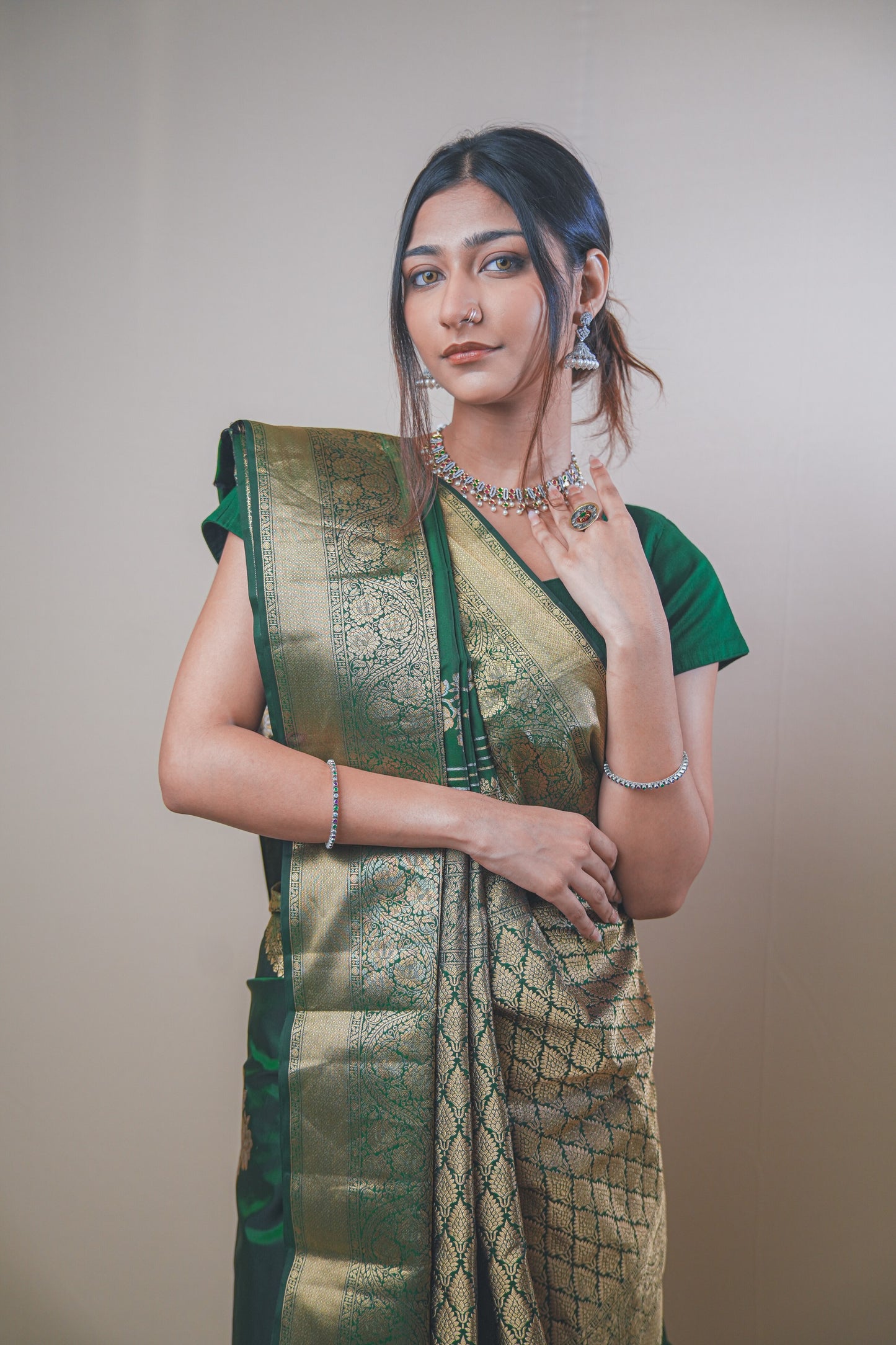 Traditional Green Kanjivaram Silk Saree Featuring Detailed Zari Work