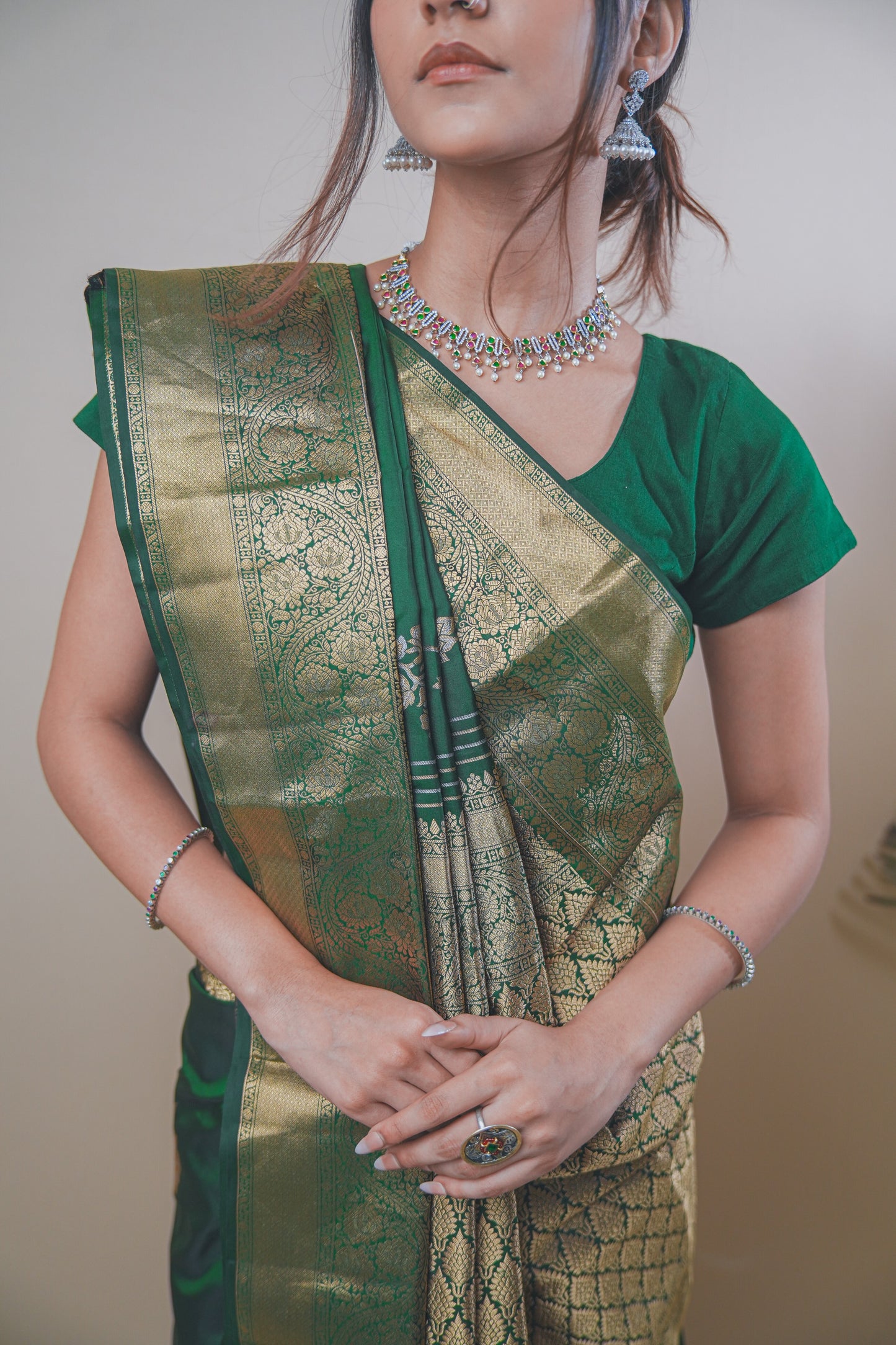 Traditional Green Kanjivaram Silk Saree Featuring Detailed Zari Work
