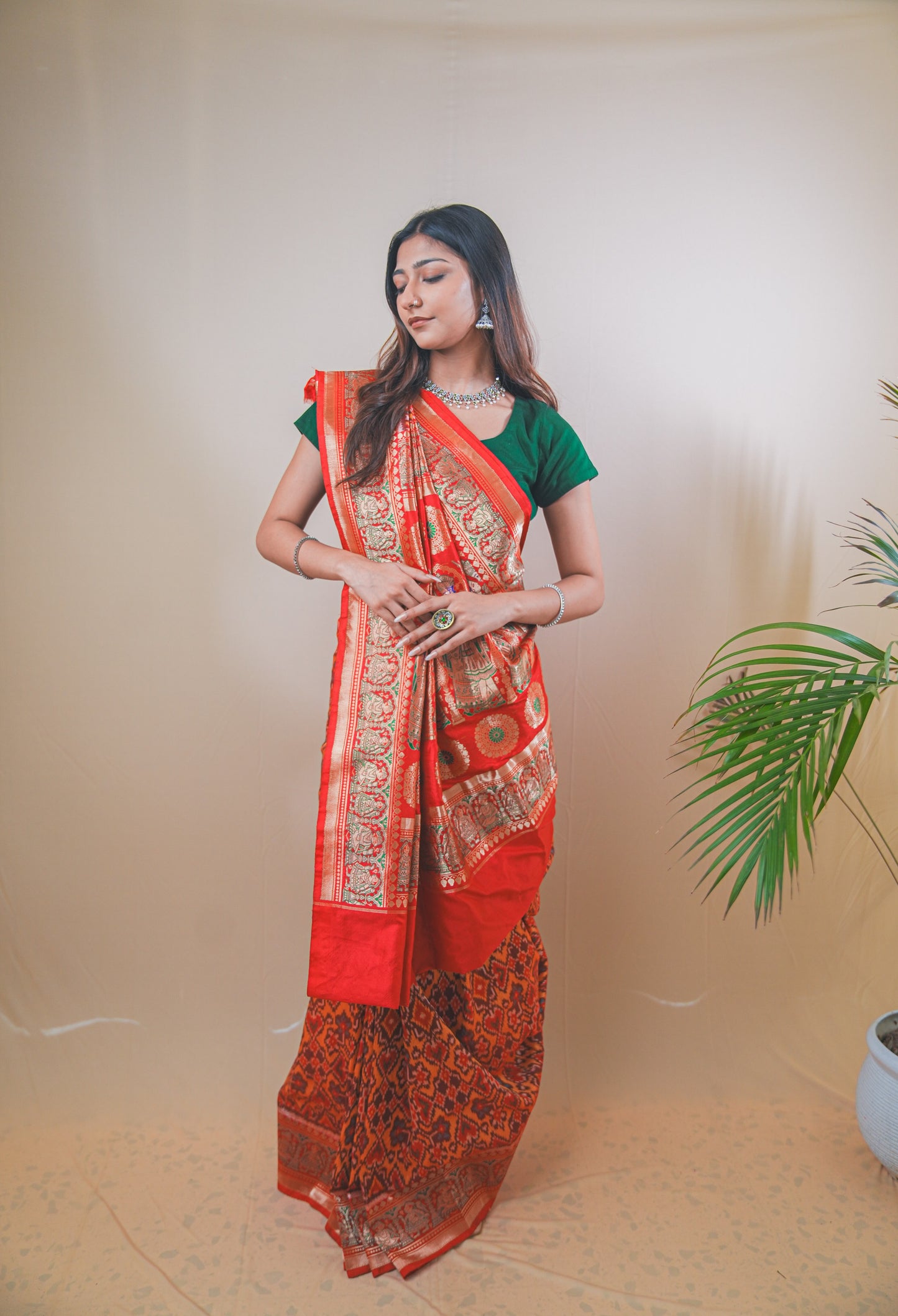 Rich Ikkat Patola Silk Saree with Classic Amdavadi Border Detailing