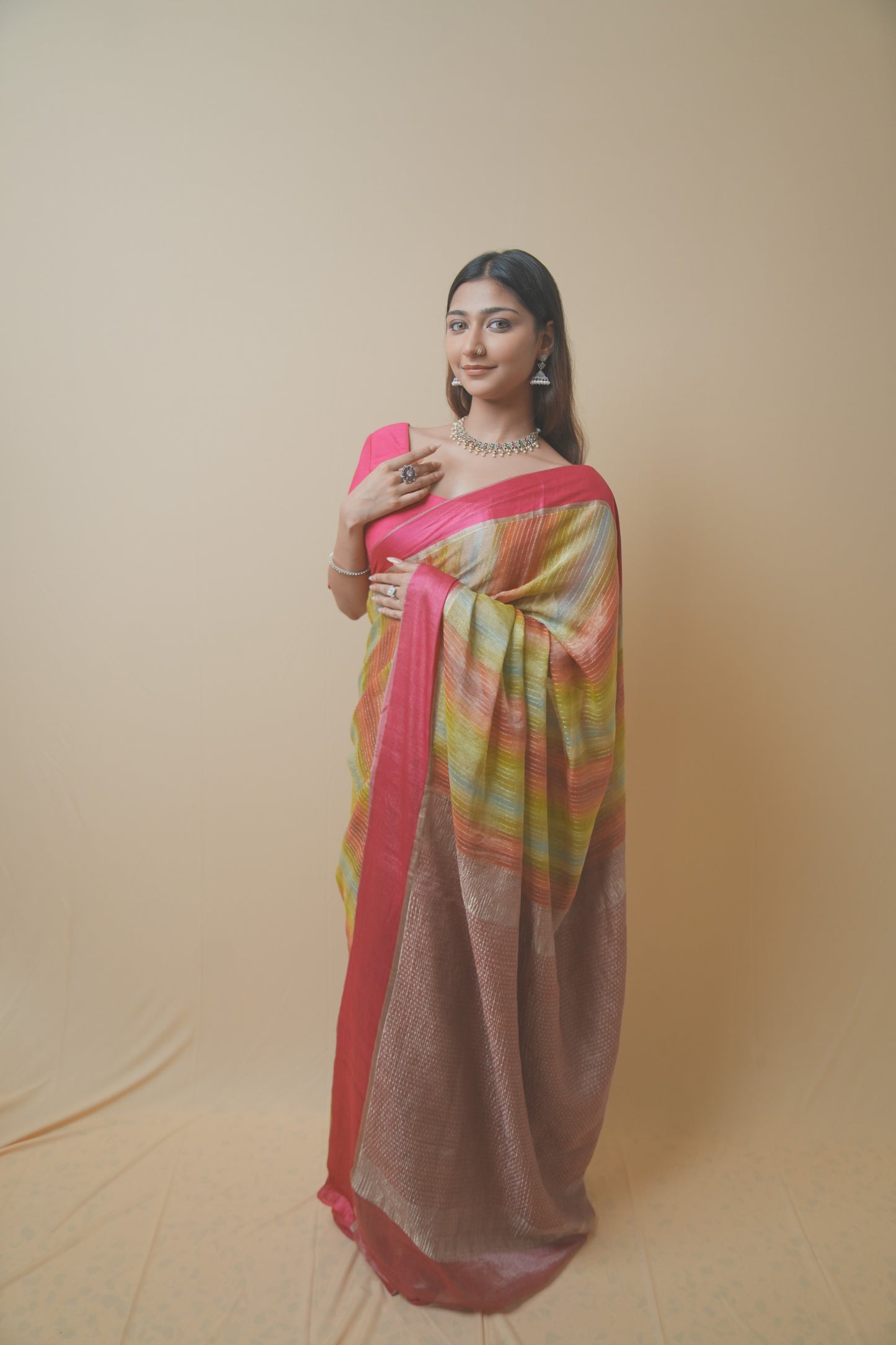 Vibrant Stripe Weave Chiffon Saree with Rich Pink Border