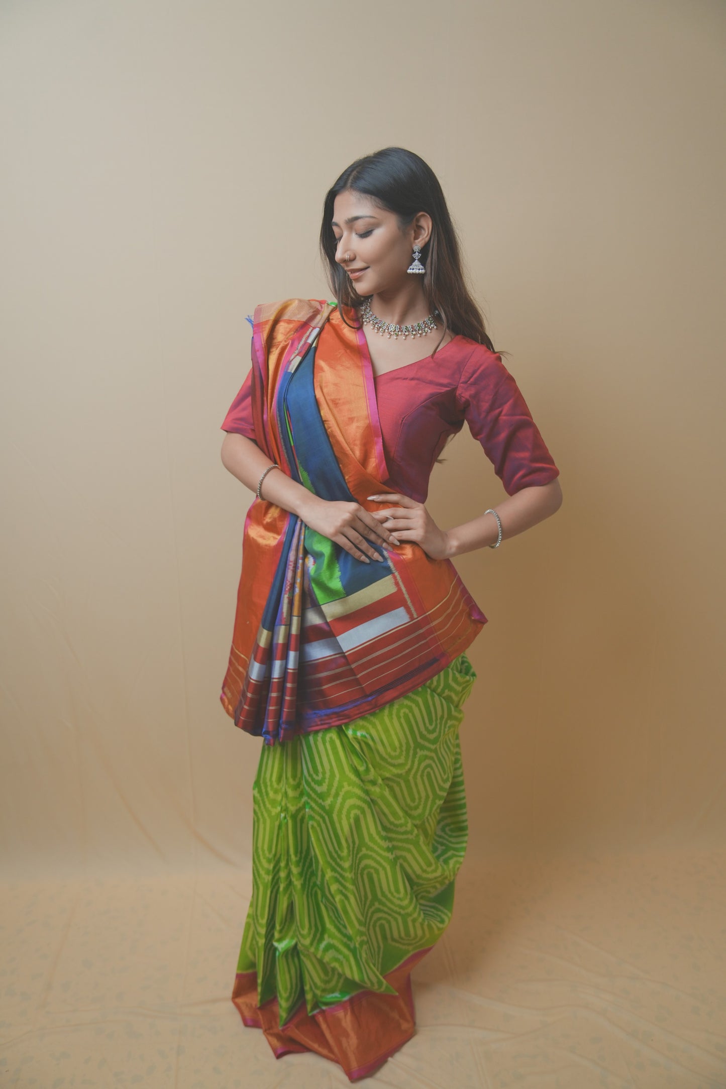 Rajkoti Patola Silk Saree Featuring Bold Designer Pallu and Contrast Green Ikat