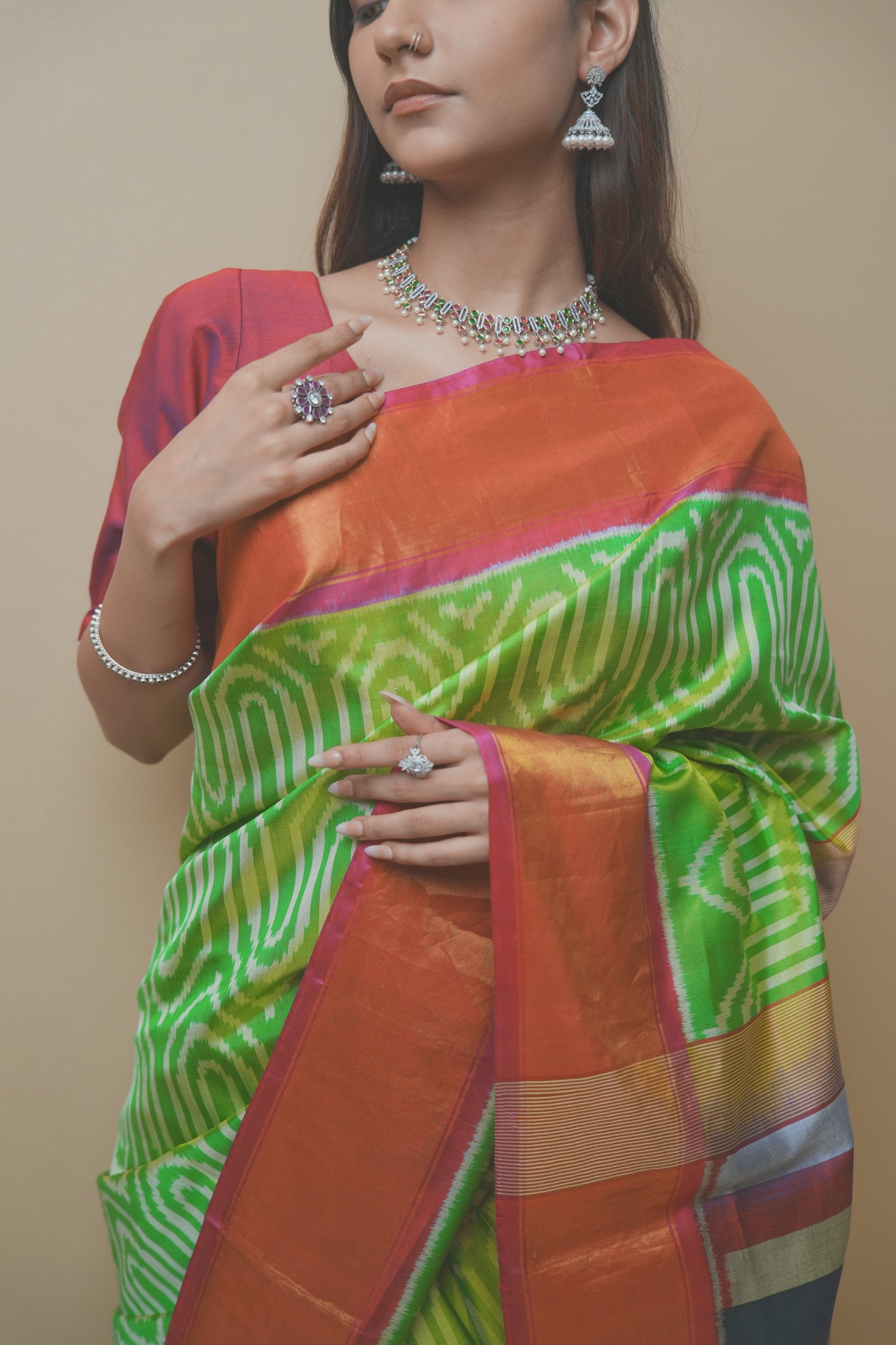 Rajkoti Patola Silk Saree Featuring Bold Designer Pallu and Contrast Green Ikat