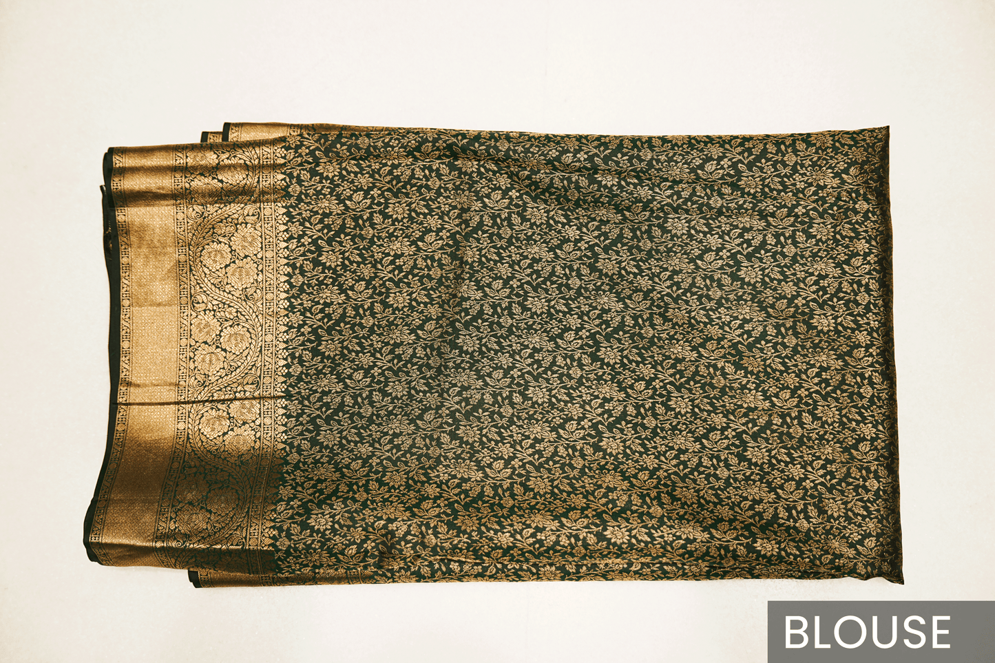 Traditional Green Kanjivaram Silk Saree Featuring Detailed Zari Work