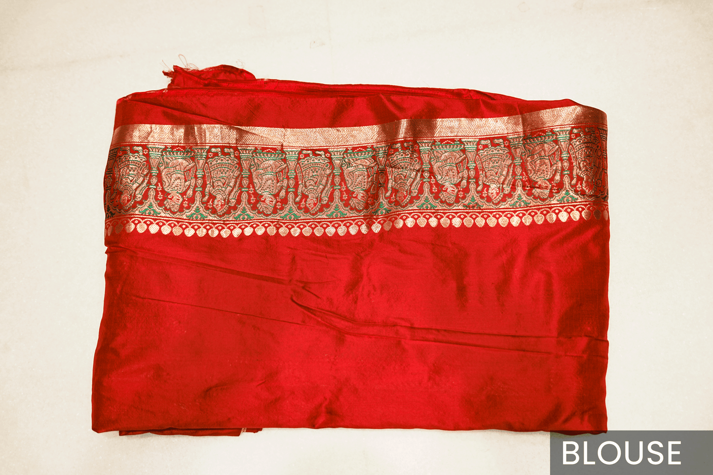Rich Ikkat Patola Silk Saree with Classic Amdavadi Border Detailing