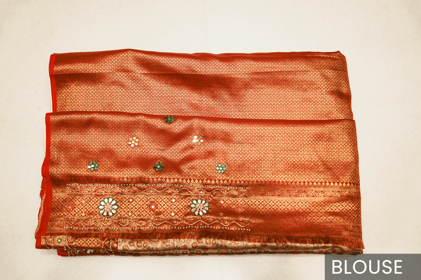 Rust Orange Kanjeevaram Silk Saree with Elegant Kundan Work