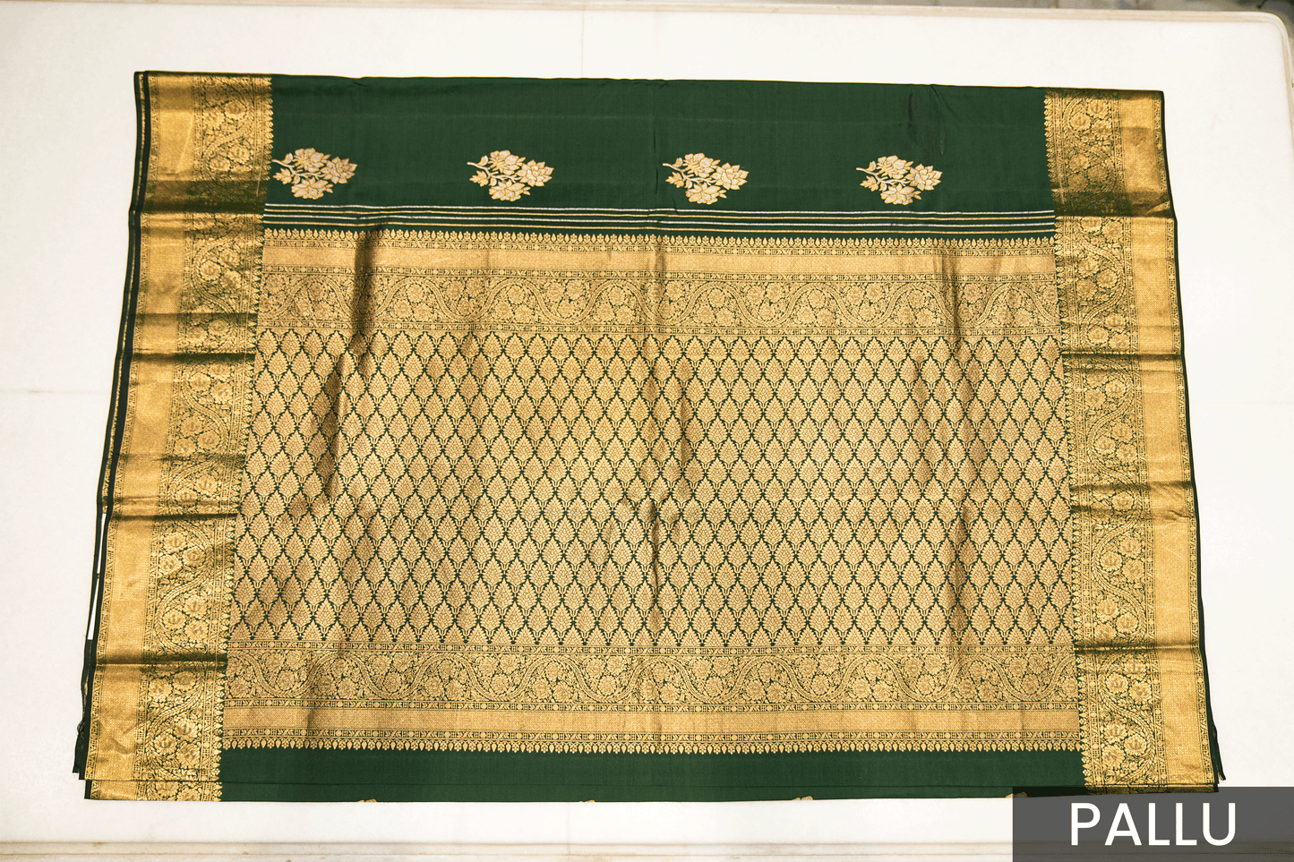 Traditional Green Kanjivaram Silk Saree Featuring Detailed Zari Work