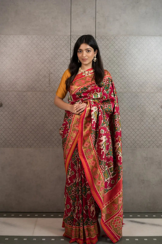 Royal Red Patola Art Silk Saree with Traditional Motifs & Tassels