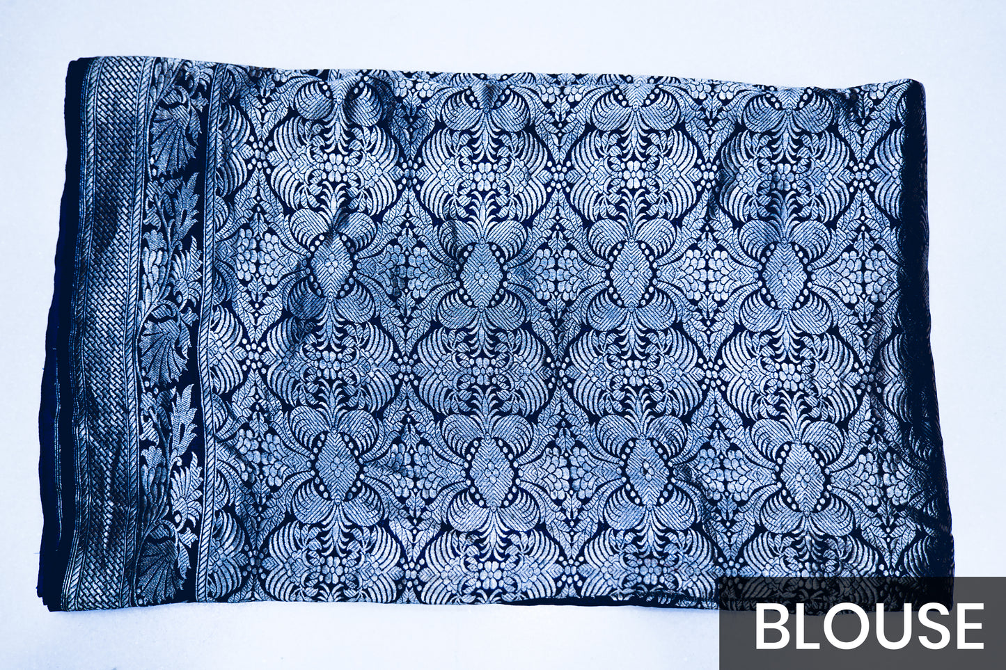Elegant Blue Satin Silk Saree Featuring Silver Zari and Printed Patterns