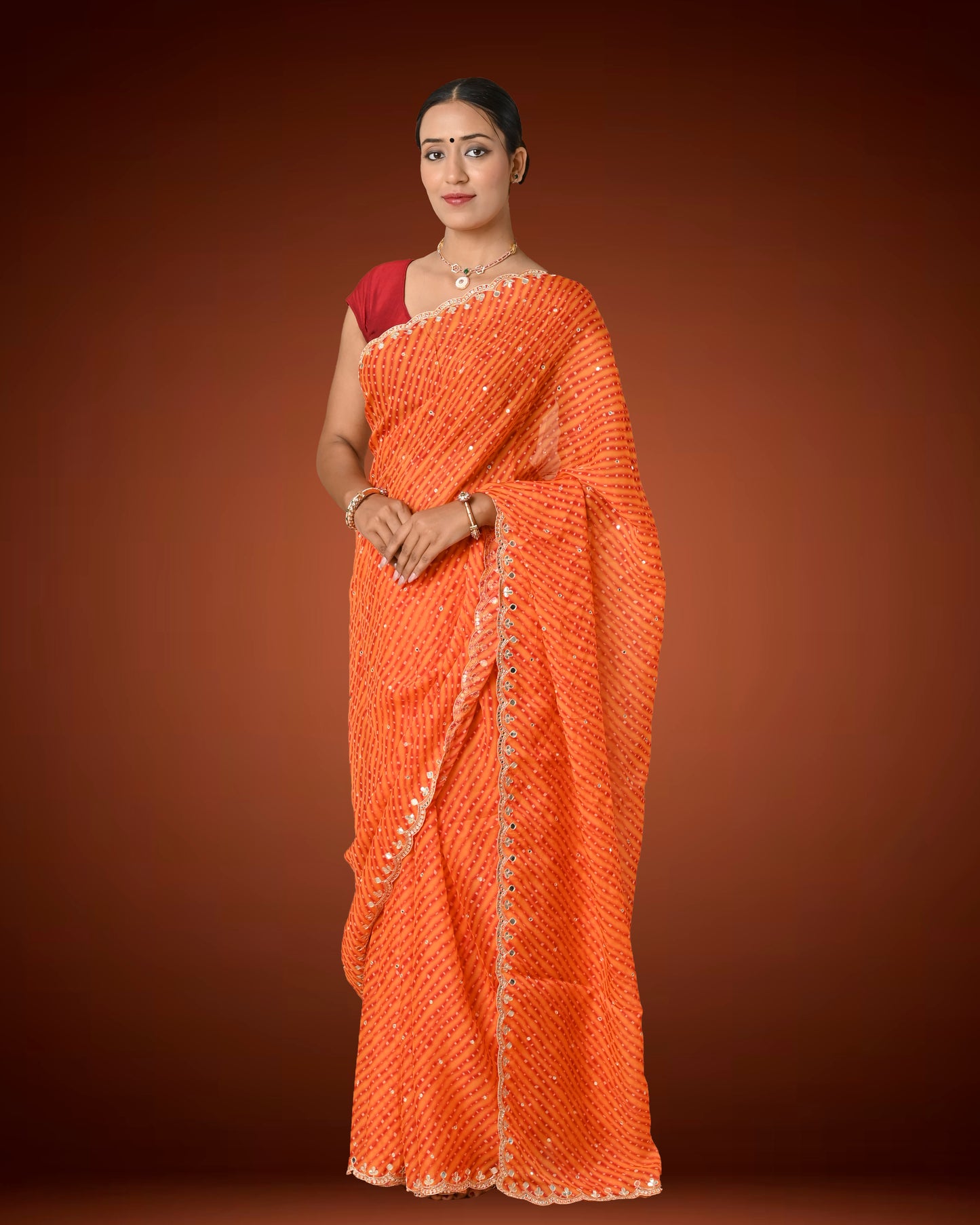Orange Crape Georgette Leheriya Saree with Mirror Work Border