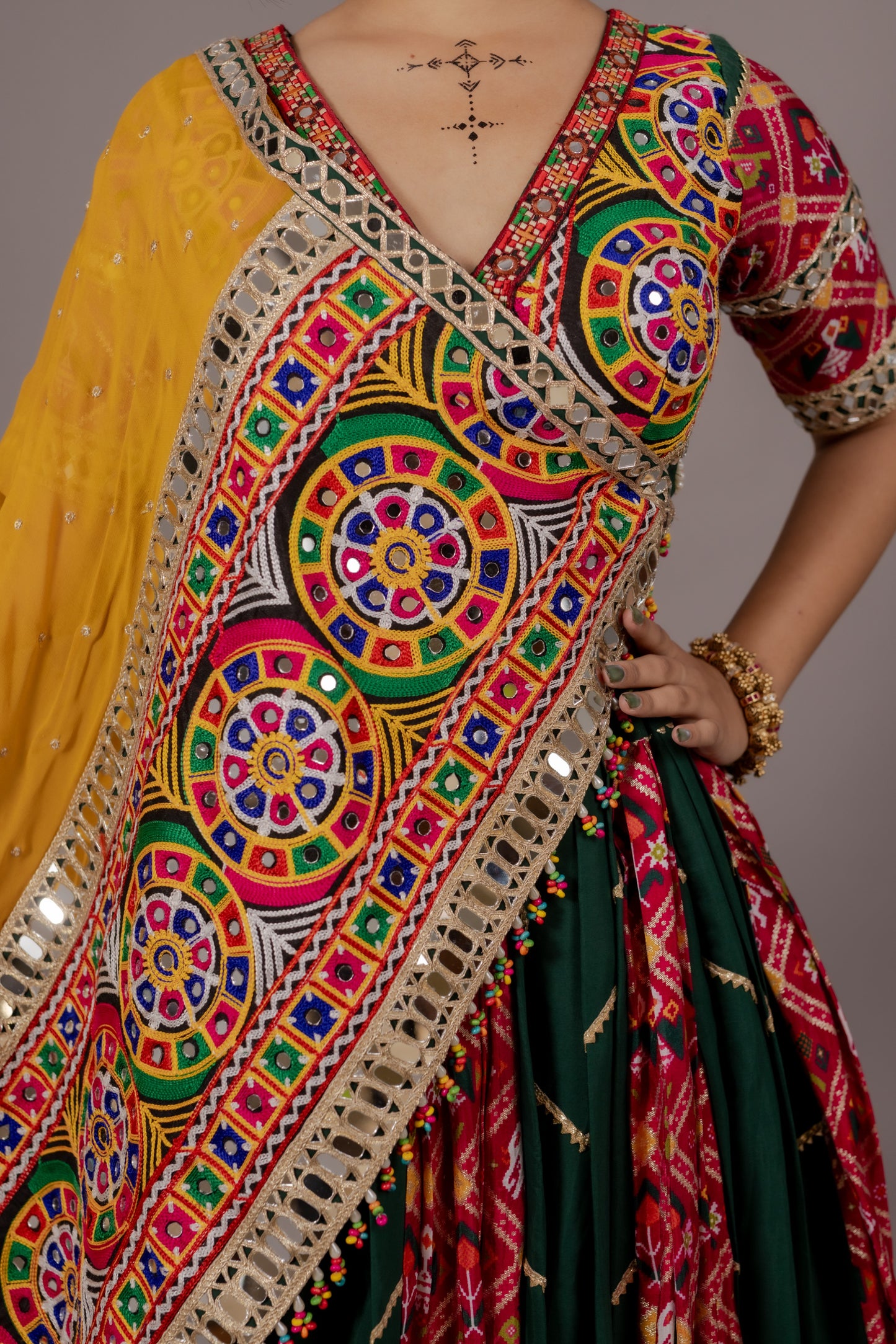 Dark Green Patola Chaniya Choli with Heritage Mirror Work & Mustard Dupatta