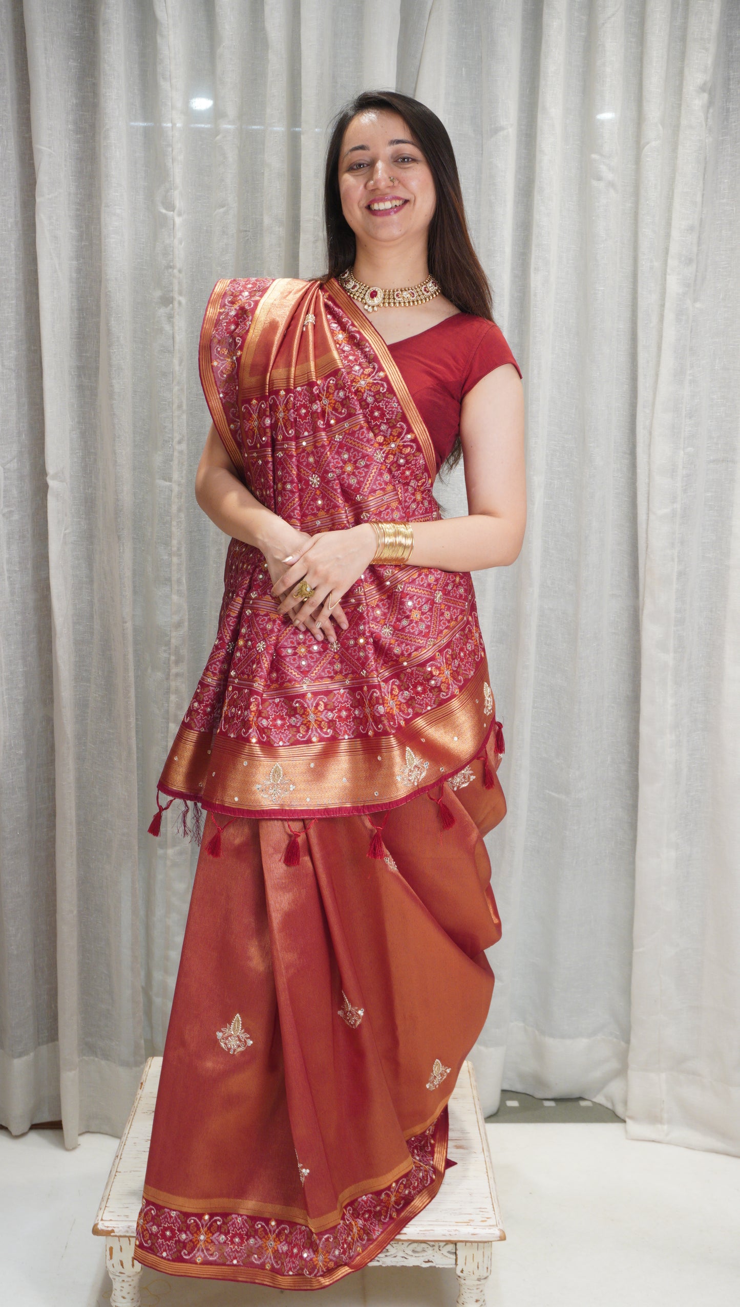 Rust Royal Tissue Silk Saree with Zardozi Work & Patola Border