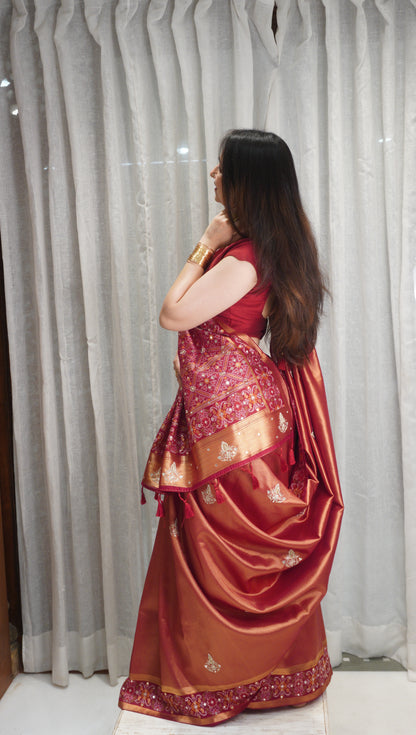 Rust Royal Tissue Silk Saree with Zardozi Work & Patola Border