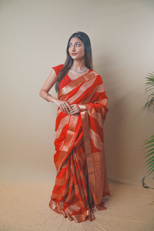 Radiant Red Crepe Silk Saree Featuring Detailed Zari Work