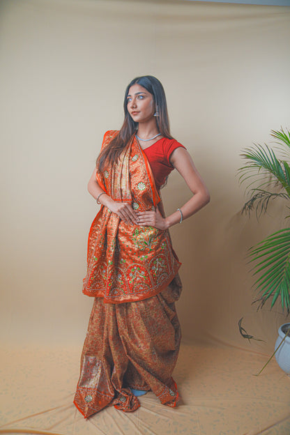 Rust Orange Kanjeevaram Silk Saree with Elegant Kundan Work