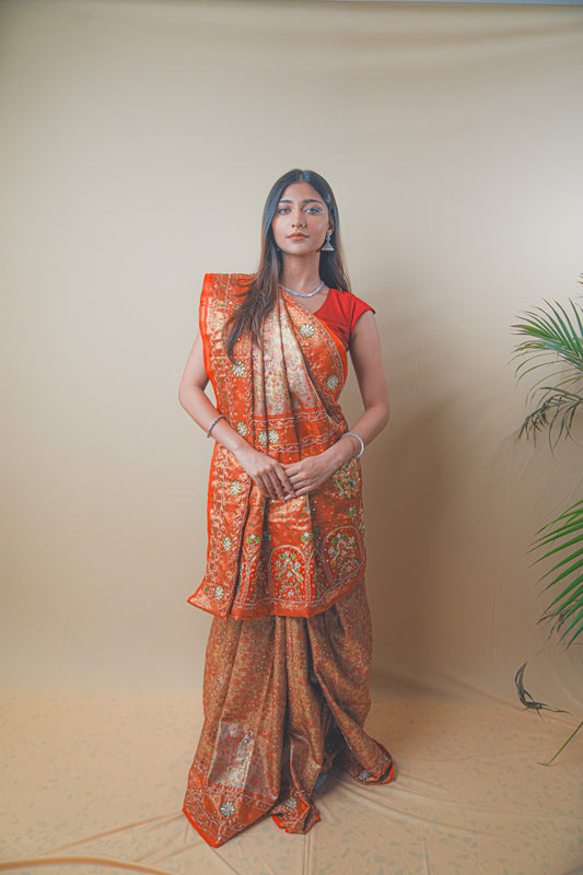 Rust Orange Kanjeevaram Silk Saree with Elegant Kundan Work