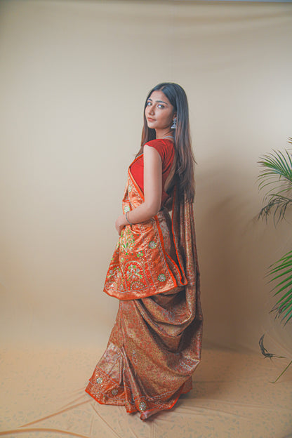 Rust Orange Kanjeevaram Silk Saree with Elegant Kundan Work