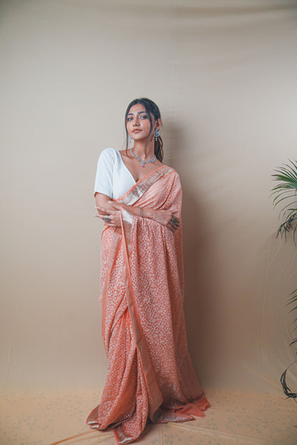 Graceful Peach Chiffon Saree with Resham Thread Embroidery & Golden Zari Border