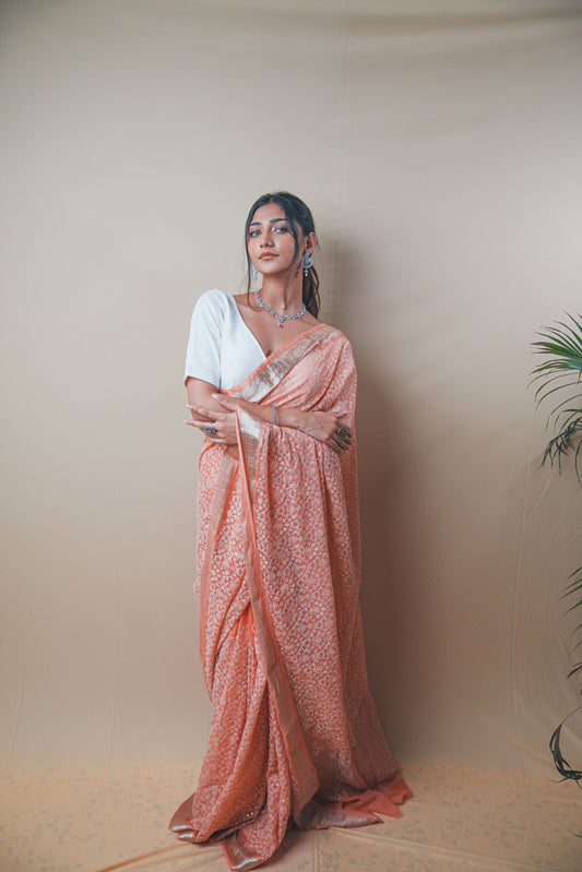 Graceful Peach Chiffon Saree with Resham Thread Embroidery & Golden Zari Border