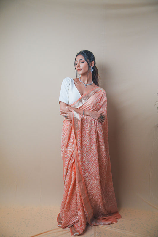 Graceful Peach Chiffon Saree with Resham Thread Embroidery & Golden Zari Border