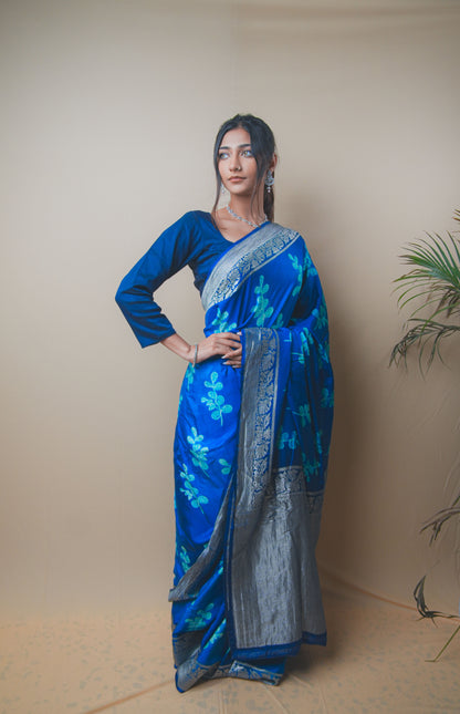 Elegant Blue Satin Silk Saree Featuring Silver Zari and Printed Patterns