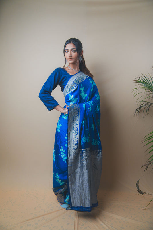 Elegant Blue Satin Silk Saree Featuring Silver Zari and Printed Patterns