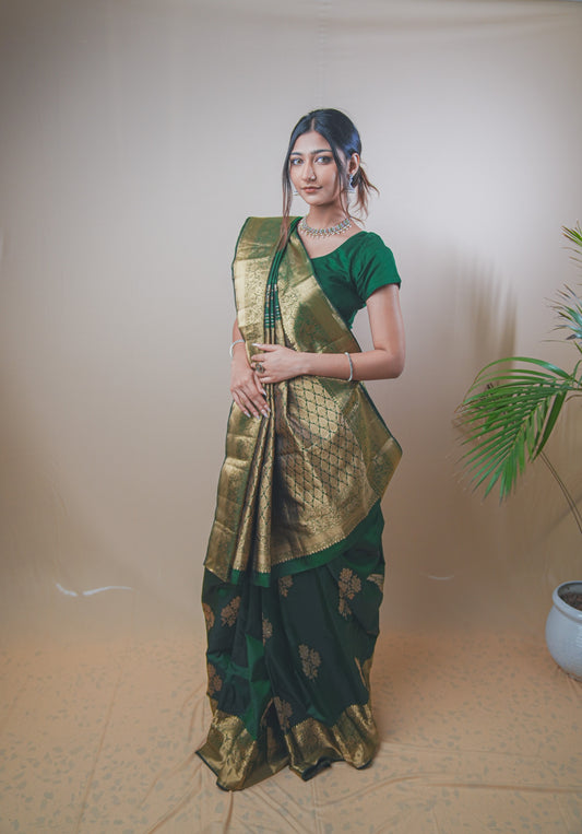 Traditional Green Kanjivaram Silk Saree Featuring Detailed Zari Work