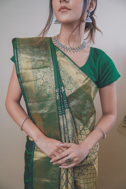 Traditional Green Kanjivaram Silk Saree Featuring Detailed Zari Work