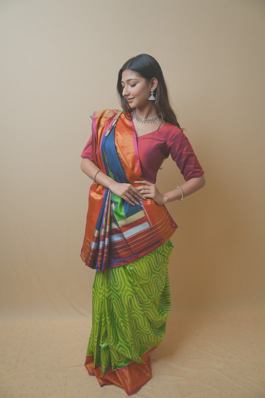 Rajkoti Patola Silk Saree Featuring Bold Designer Pallu and Contrast Green Ikat
