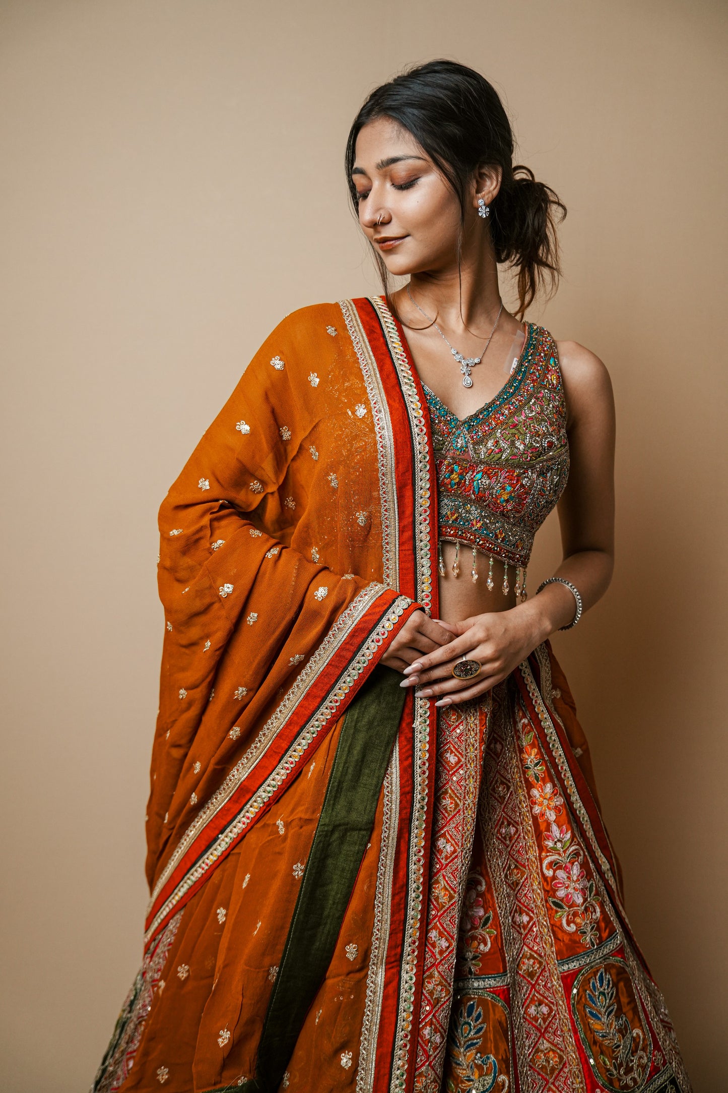 Exquisite Raw Silk Lehenga Featuring Traditional Kasab and Pita Work