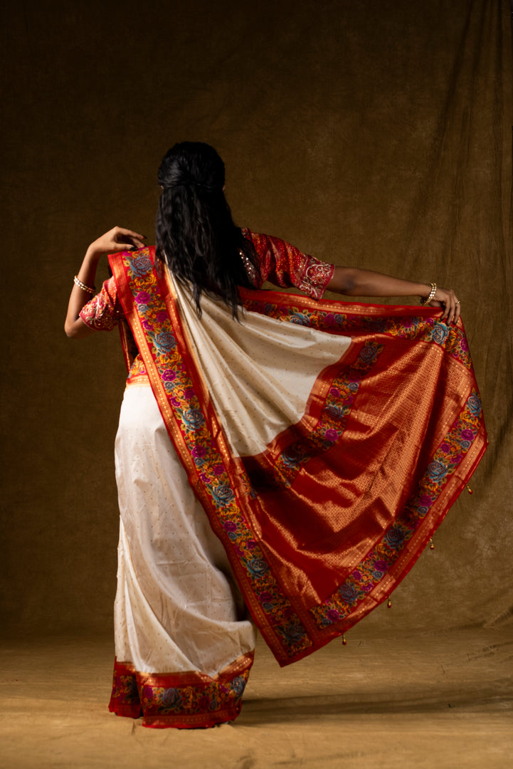 Ivory Silk Saree with Red Pallu and Multicolor Border Work