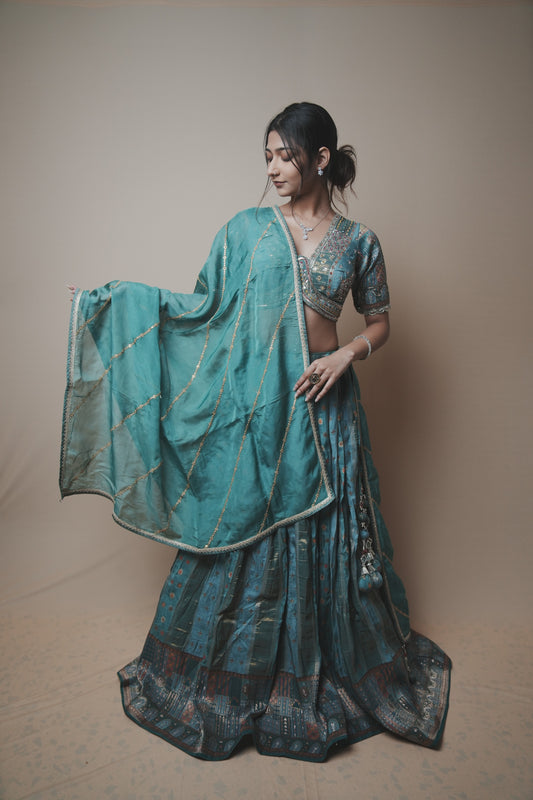 Tortoise Banarasi Silk Lehenga Set with Hand Embroidered Mukesh & Kardana Work