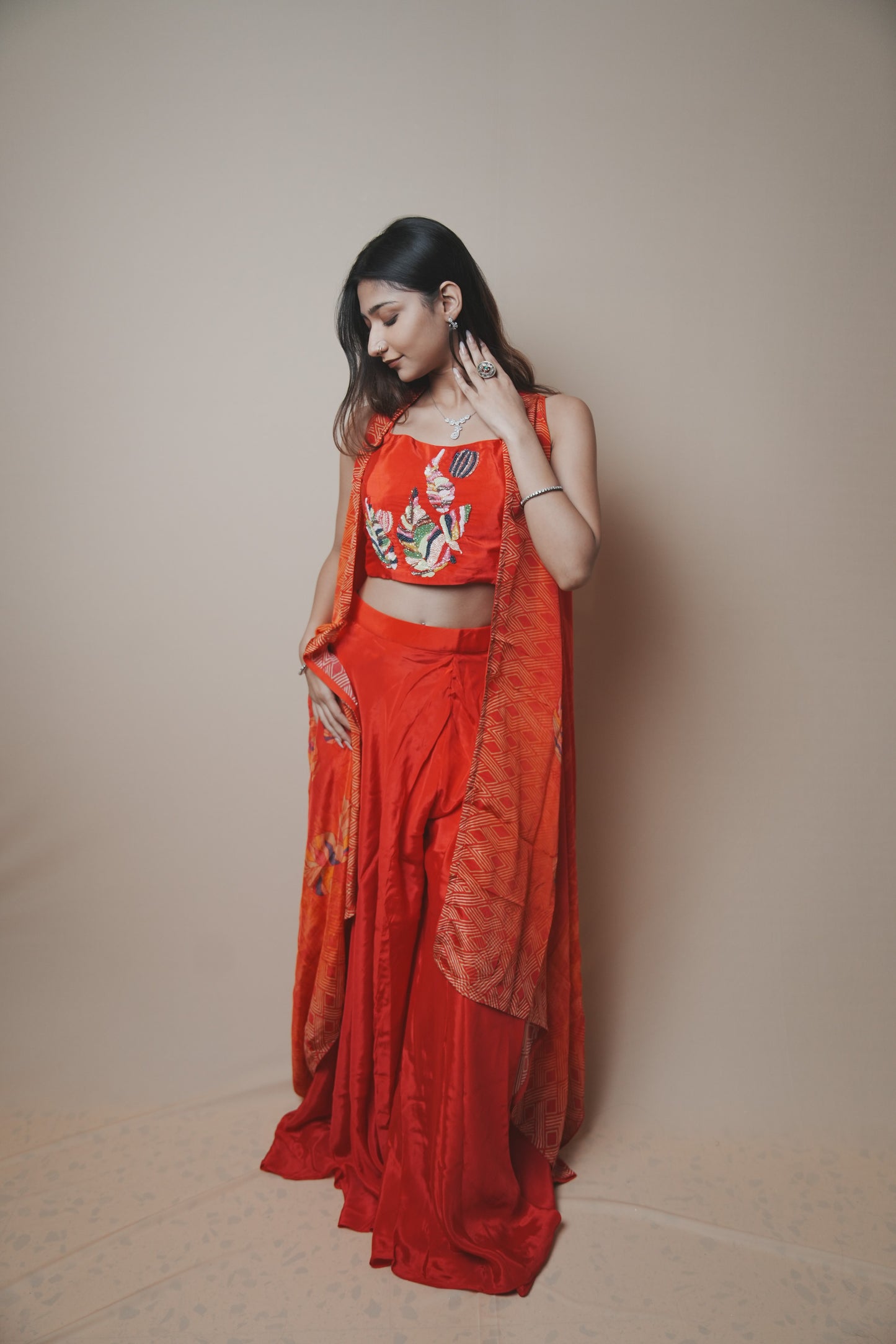 Stylish Red Crepe Silk Set Featuring Embroidered Choli & Multicolor Shrug