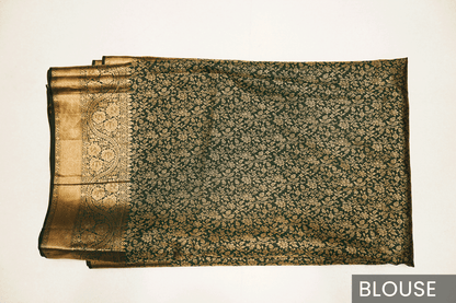 Traditional Green Kanjivaram Silk Saree Featuring Detailed Zari Work