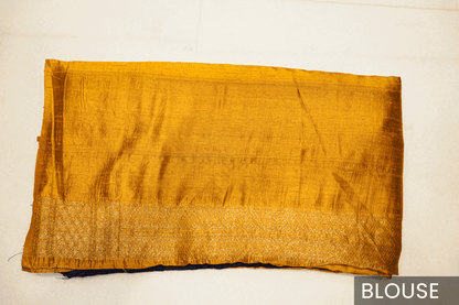Pink Banarasi Raw Silk Saree with Golden Zari Work and Contrasting Blue-Yellow Border