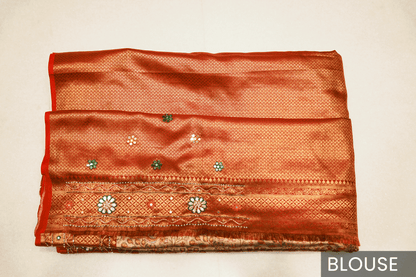 Rust Orange Kanjeevaram Silk Saree with Elegant Kundan Work