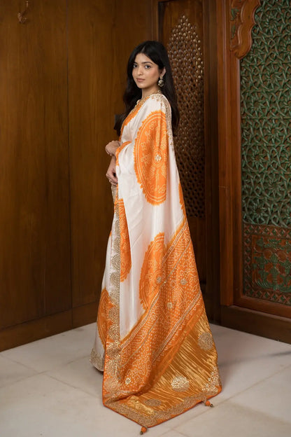 Ivory Orange Shamu Gajji Silk Bandhani Saree with Gota Patti Work