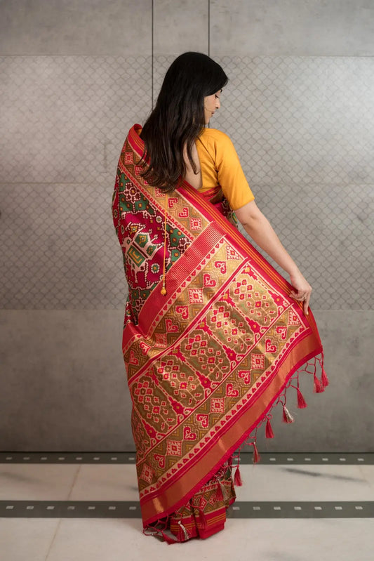 Royal Red Patola Art Silk Saree with Traditional Motifs & Tassels