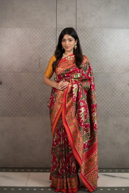 Royal Red Patola Art Silk Saree with Traditional Motifs & Tassels
