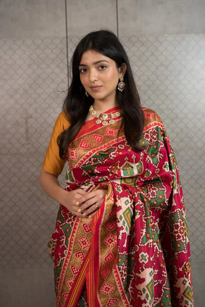 Royal Red Patola Art Silk Saree with Traditional Motifs & Tassels