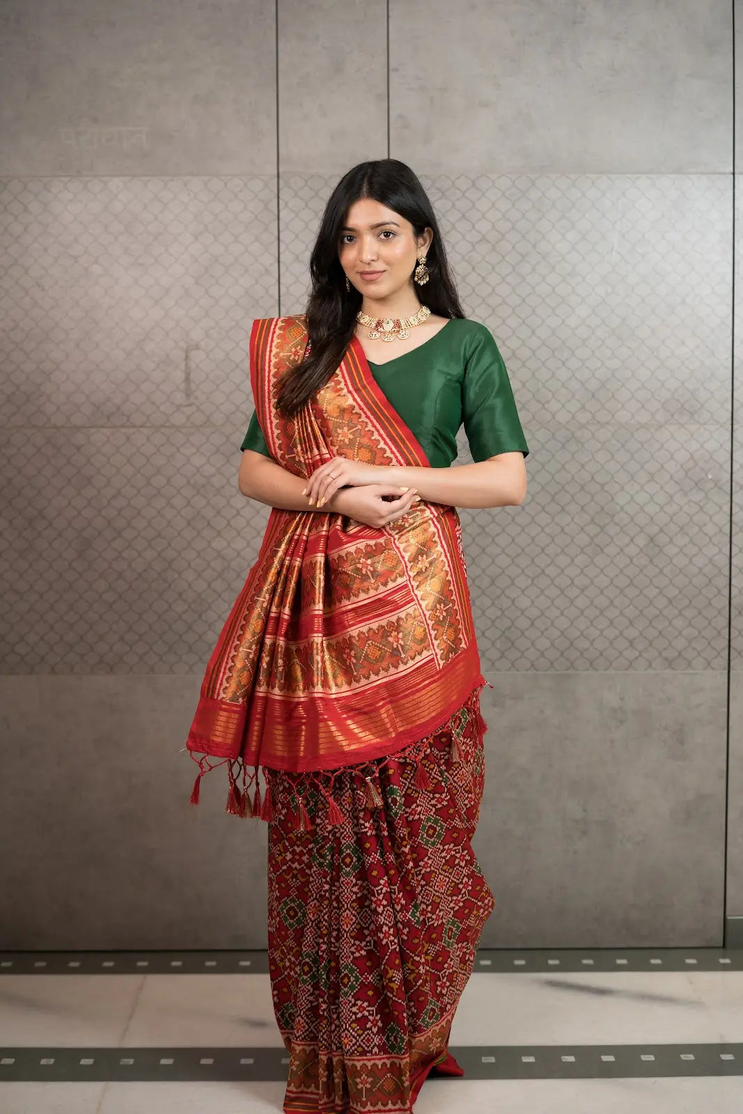 Classic Red Patola Silk Saree with Traditional Woven Border & Tassels
