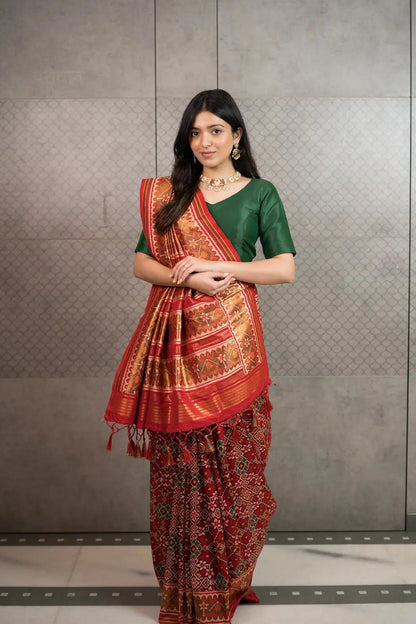 Classic Red Patola Silk Saree with Traditional Woven Border & Tassels