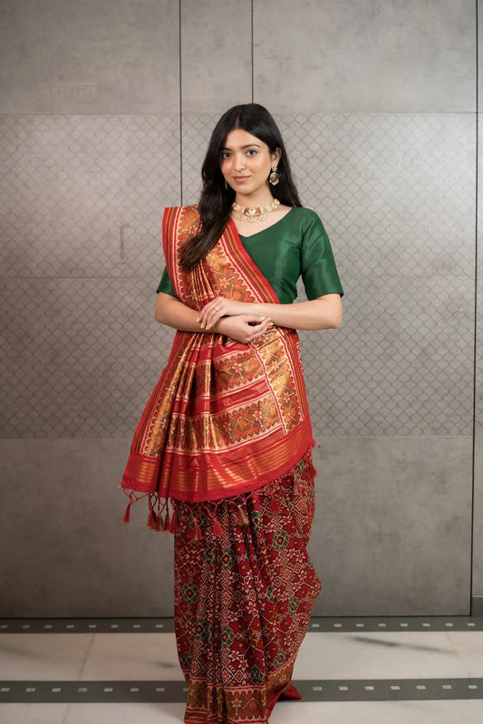 Classic Red Patola Silk Saree with Traditional Woven Border & Tassels